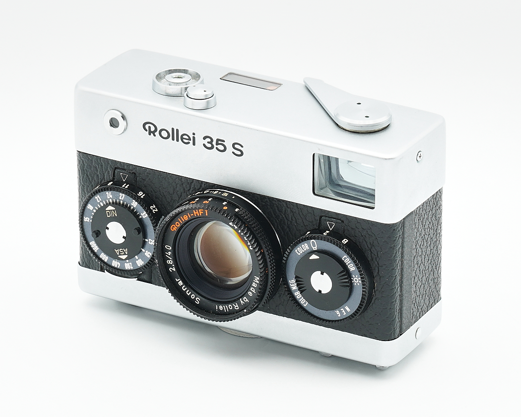 35-mm Kamera, Spiegelreflex? (rangefinder), manuelle Bedienelemente, Silber-Schwarz, Objektivwahl